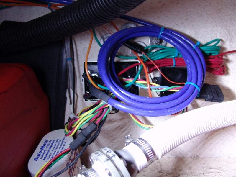 Electronics and extra wire. Main control module on left, auto tab retractors on right.