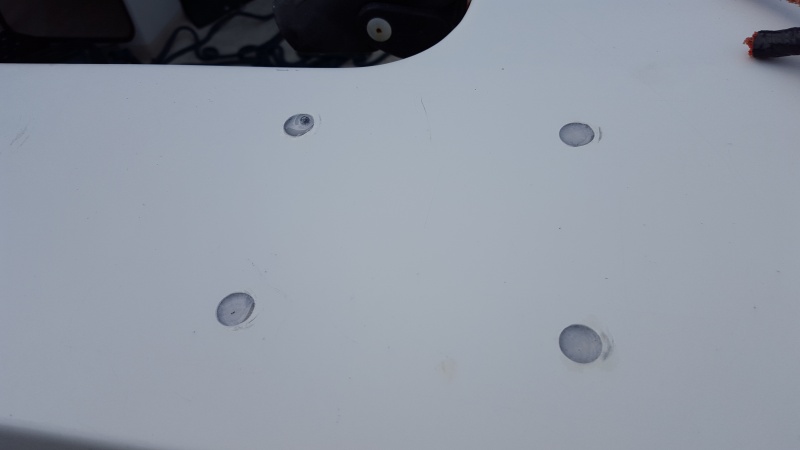 Epoxy filled holes. Notice the air bubble... Fixable though.