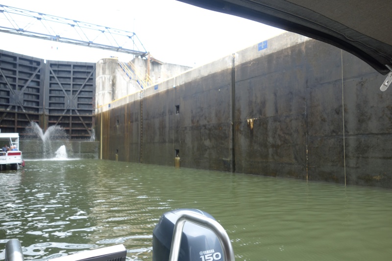 Erie lock chambers fill from the middle, pressing your boat against the lock walls.  You don't want a fender to get trapped in a niche like those on the right.  Have a sharp knife ready.