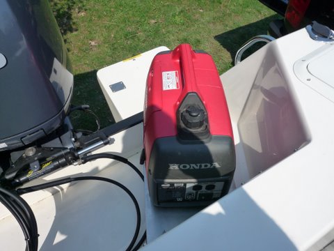 exhaust out the back, motor well to keep noise and fumes at a mimimum,boat should swing into the wind. Summer in New Jersey it's nice to close up the boat and run air conditioning to sleep cool with out the flying critters climbing in bed with you.