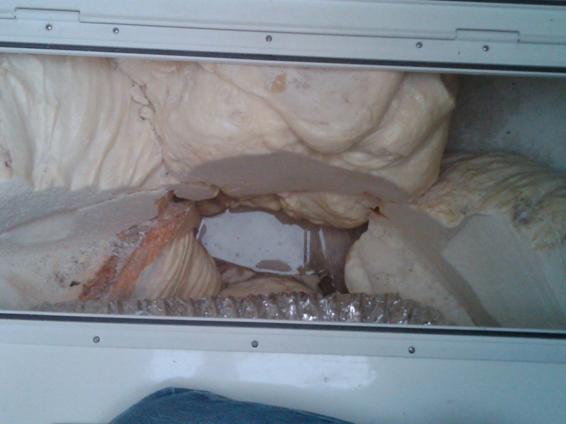 extreme bow access hatch with the "Cape Cruiser" infamous water.  Looks like whale intestines.  The water looks like a mirror in this pic.