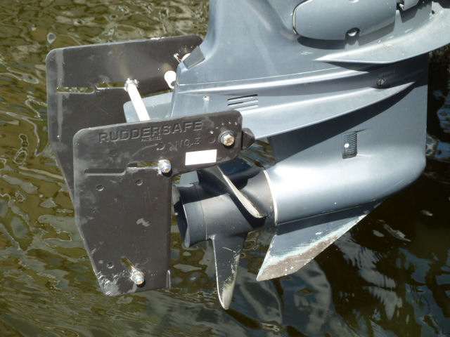 F80 Yamaha with "Ruddersafe" attachment. Huge improvement in steerage in minimum/no-wake speed zones which are prevelent in Manatee zones and canals.