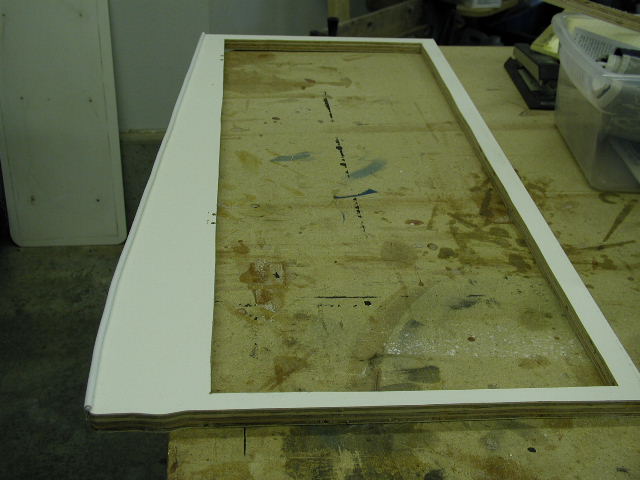 Face frame removed from cabinet.  Cut-out enlarged.