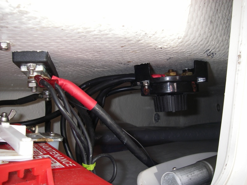 Factory battery Switch relocated to allow 2 battery installation.Relocated  Grounding Bus