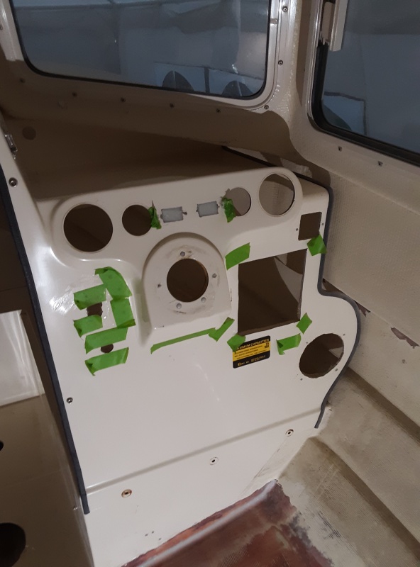 Filling the smaller holes and the two openings for the hour meters. the hour meters will get moved down slightly to allow for a voltmeter for each engine