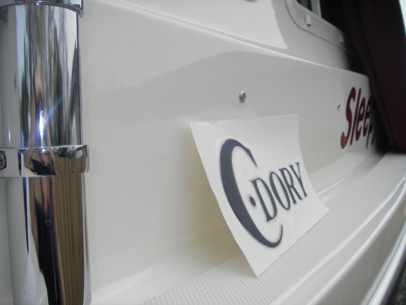 Finally get to make it an "Official C-Dory".  Probably came with the old style decals but were removed by Jim to mount the rod holders.
