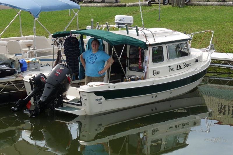 Finally in the water.  The Canal had a leak and they closed just east of Lockport.  So we found "Mid Lakes Marina near Masdon, NY. It held 2 C-Dorys in it's 30 boat home goup and the owners group was having a pot luck that night and had us join them.  Penny was really glad to get Two Bears in the water.  "It ROCKS" she said.
