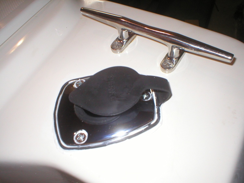 Finished lazarette rod holder mount/tube for groundfish jigging and ready to accept a downrigger gimbal insertion for trolling when needed.

Existing stern cleat for snapping in rod/reel if one should be nervous...