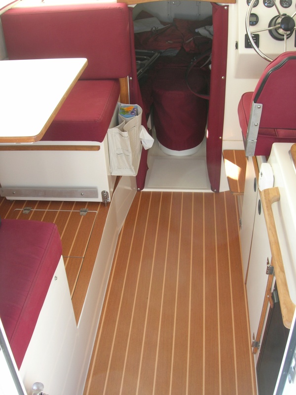 Finished product, ready to use.  The material is made by Lonseal Marine, Teak & Holly 70SE.  It comes in a 6' wide roll, cut to whatever length you desire.