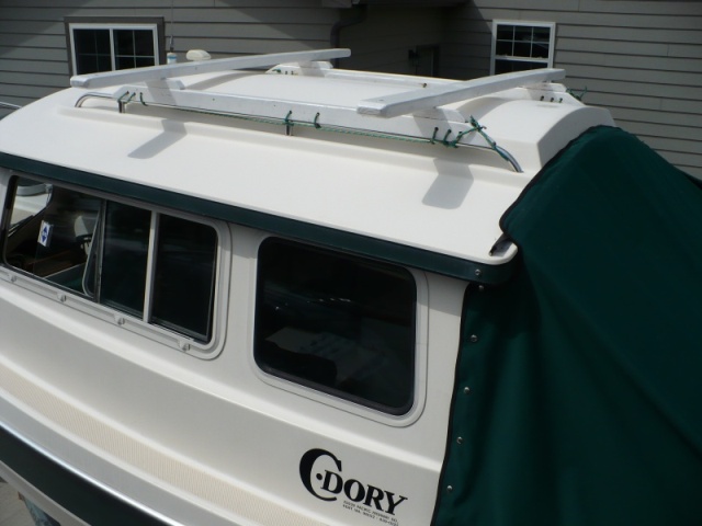 Fir kayak rack lashed on - I think this is C-Dory Grace.
