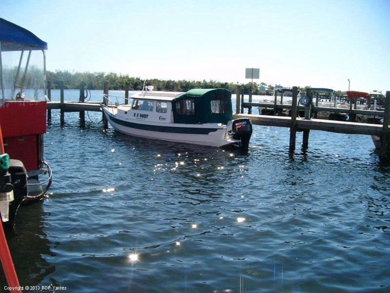 FOR SALE in Fla.  New motor, sound hull, new canvas, where do I sign?