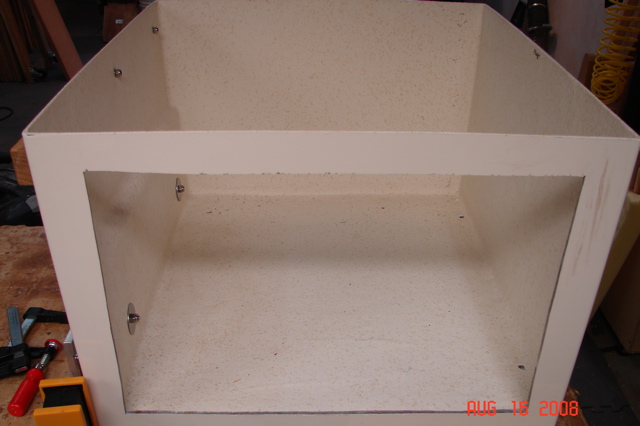 Front passenger seat base cut out for drawers