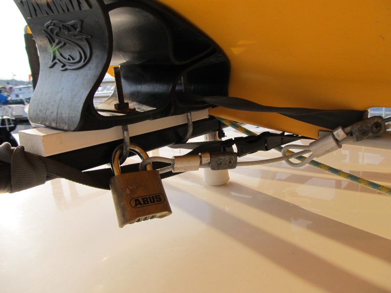 front strap to keep it from sliding rearward and also the lock/cable we keep on it while at the marina.