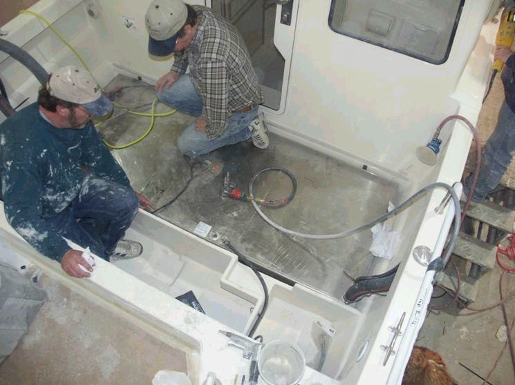 Fuel tank and fish box work.  The tank will have a cleated sealed lid to allow for removal when needed (tanks all have to come out someday). 3/15/04