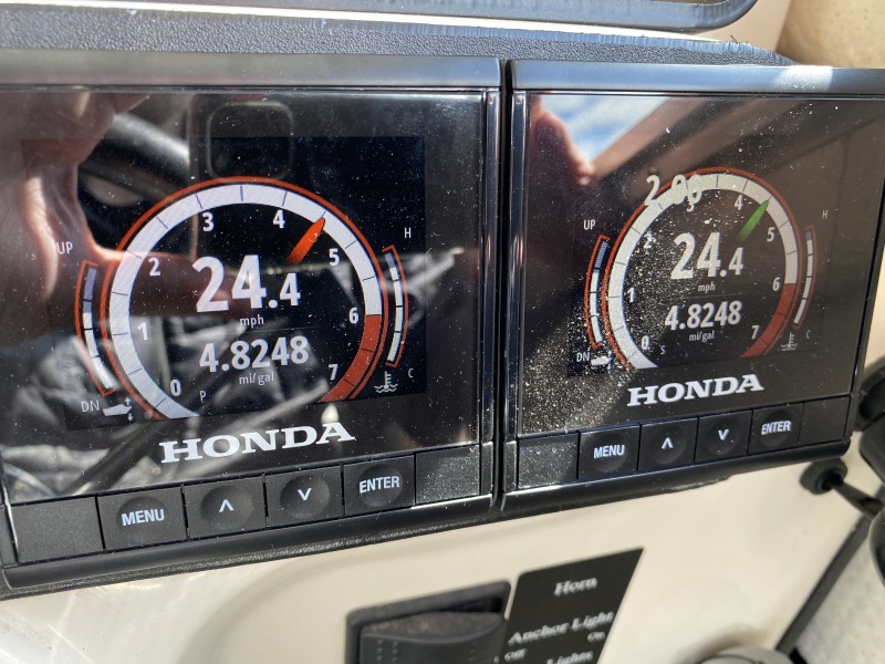 Full fuel tanks, but fairly light otherwise, sure beats the old Honda 40 numbers