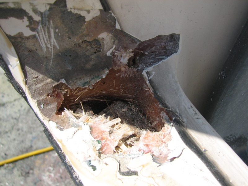 Further opening on the port side, grinding out the crack, reveals only resin, no glass or laminate.
