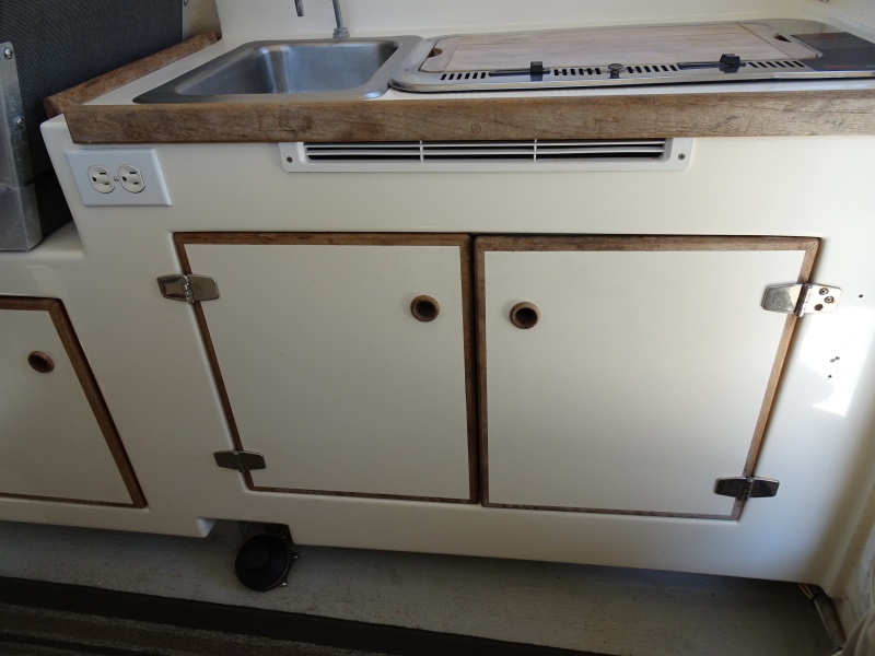 Galley and under pilot seat storage