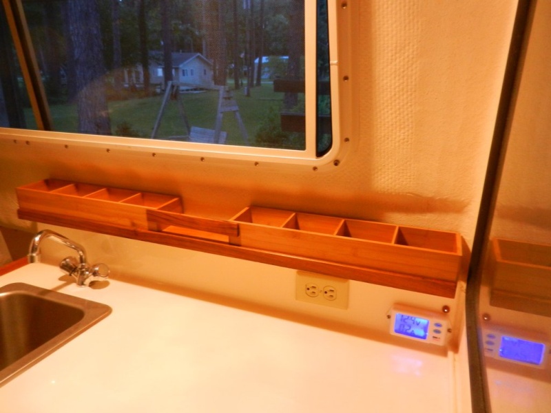 Galley shelf from some small drawer organizers, strip of plywood, and some teak trim.