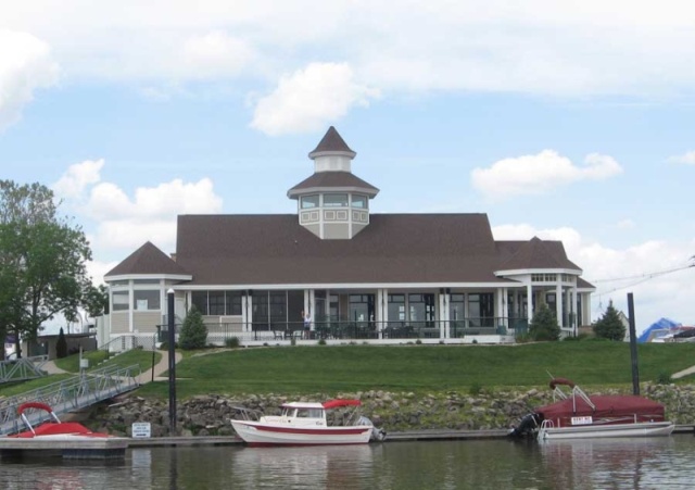 "Game On" a 19' Angler out in front of Catfish Charlie's Restaurant, waiting for everyone else to show up for the National Mississippi River C-Brat Gathering in September.