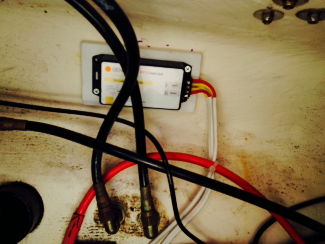 Genasun Mppt charge controller mounted on transom, near battery