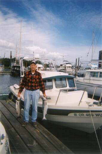 George Shields with two silvers caught in the Columbia River August 2003. My friend and fishing partner on our last trip together.