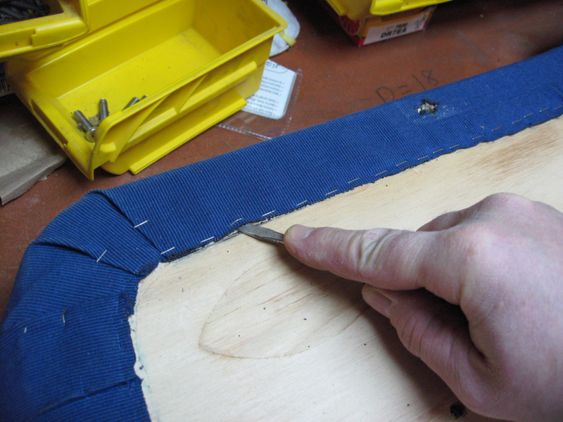 Get under the staples with screwdriver then pull with pliers.