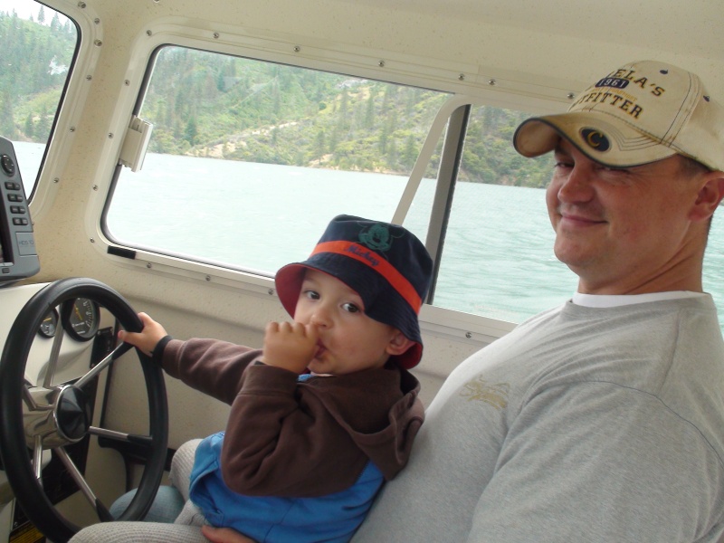 Giving Daddy boating lessons.