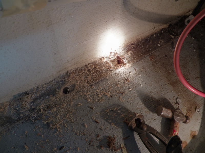 Going aft, you can see the change on a rotten fastening.  The pop rivet holes on both sides were okay.