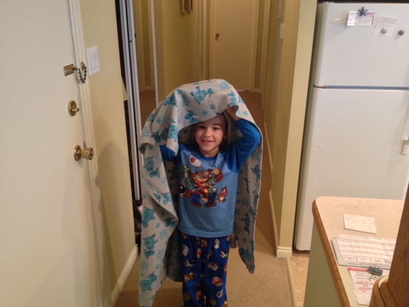 Grandson Ryder 6 years old Halloween ghost trick