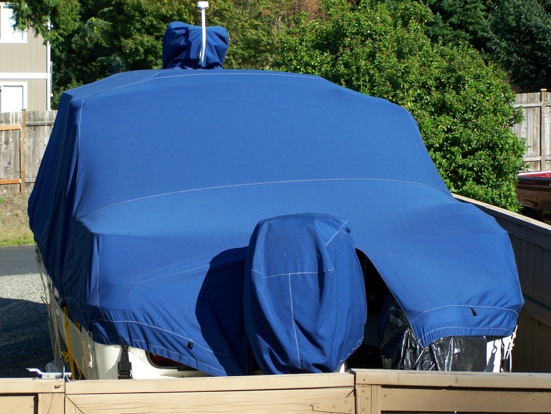 Great fit. No puddling of rain/snow. Wind can not get under cover. Outboard motor cover is seperate piece.