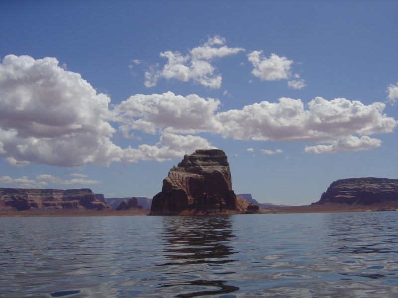 Gregory Butte, smooth water, and clouds