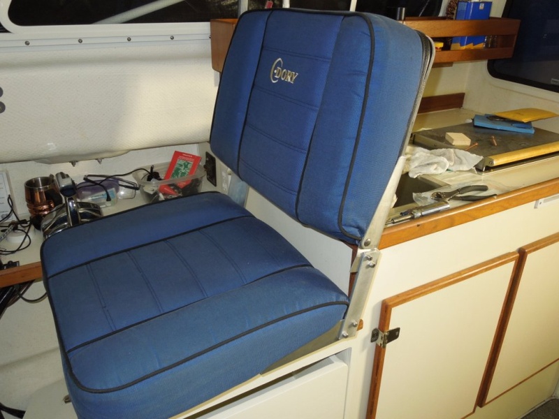 Had the helm seat reupholstered with high density foam.  $$$