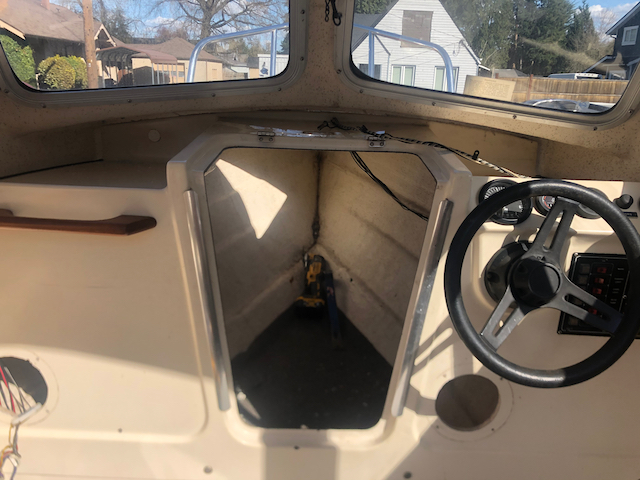 Had to drop the front bulkhead to access the area of damage on the aft side of the hatch. Front bulk head held on by a sealant and screws. Not sure if sealant was factory original or not.