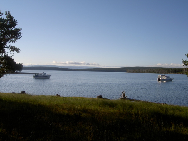 Halcyon and Roger and Mary Jo's C-Dory anchored in Eagle Bay morning after being run off campfire by the snow on Sept 1