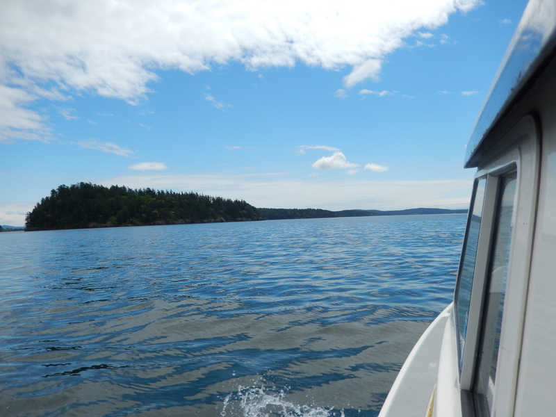 Heading back--See-Saw in the San Juans, with islands and clouds for company