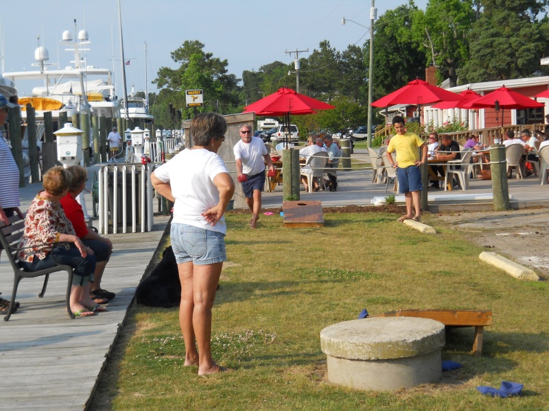 heated game of cornhole at Coinjock