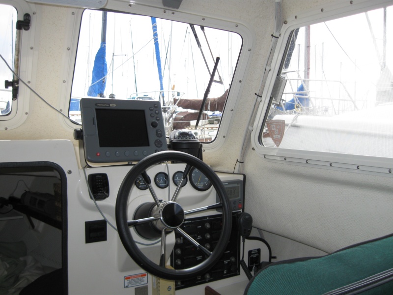 Helm, Raymarine C80, autopilot, DSM300, 2kw radar, Ritchie compass, Icom vhf, Bennett trim tabs