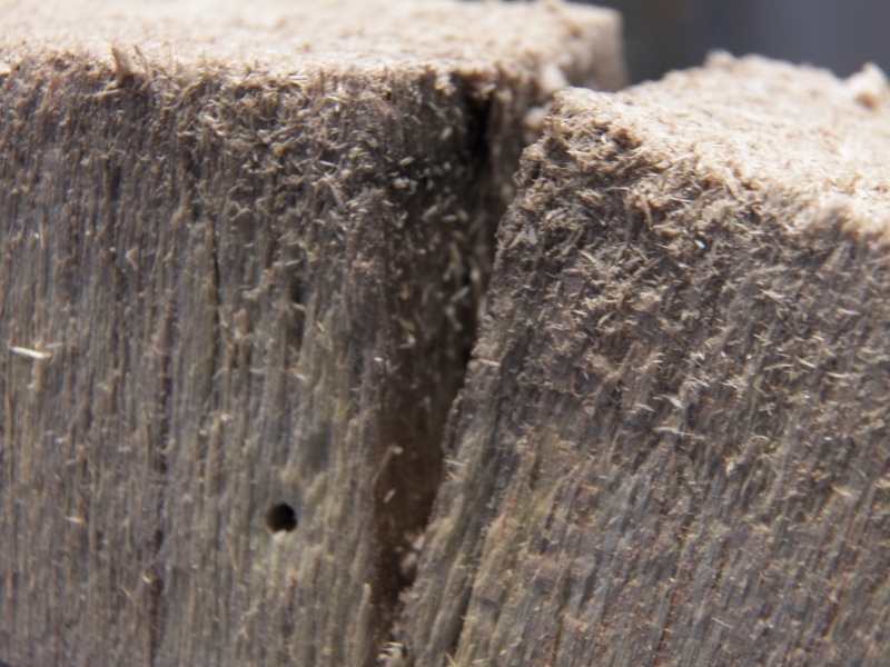 Here I have flexed the piece to show how the balsa is not solid and that in between the pieces water has passed through, stained, and maybe even mildewed.  Fortunately, there was no rot.