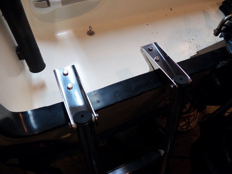 Here is the 4-step ladder deployed.  It has a "stop" feature that keeps it perpendicular to the transom.