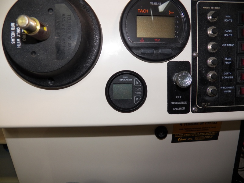 Here is the fuel management system gauge installed.  Directions said to keep it at least 20" from the radio.  I don't know which interferes with which, but it meant moving the radio.