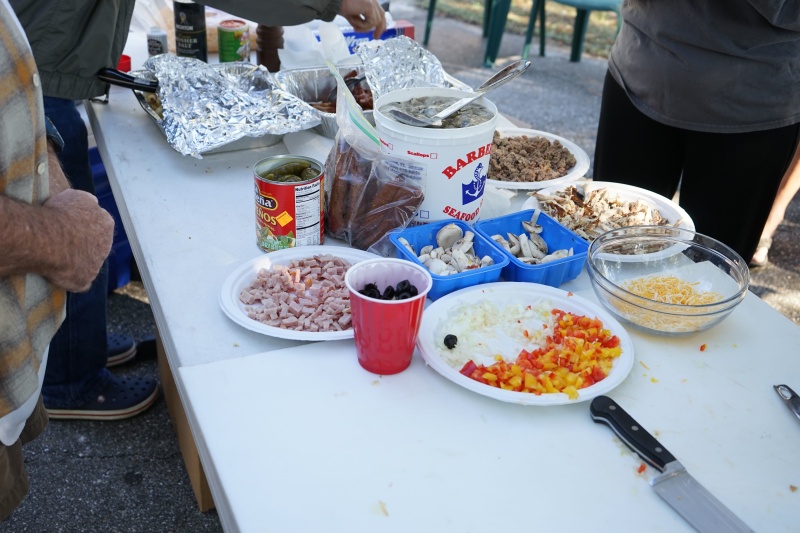 Here is what goes into these omelets: Peppers, cheese, several kinds of sausage, olives,mushrooms oysters, chives and onions