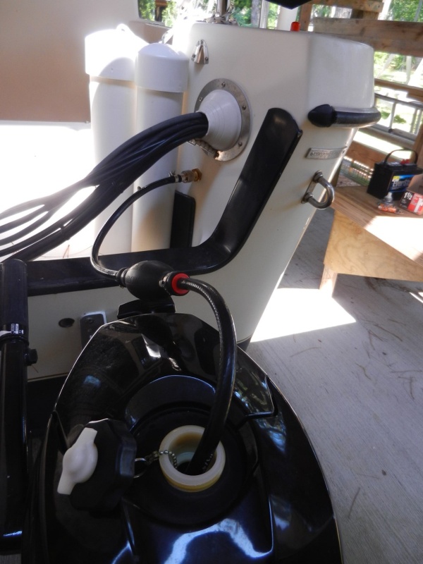 Here it is in use, refilling the dinghy outboard\'s internal tank.  Can also use it to fill the Honda EU generator easily!