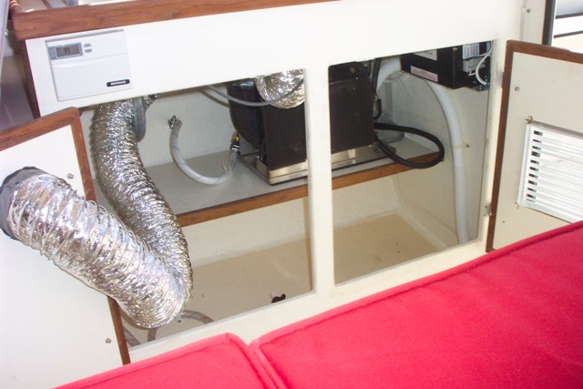 Here's another shot of the unit which shows the duct work.  All ducts are inside the cabinet, so no unsightly ducts in the cabin.