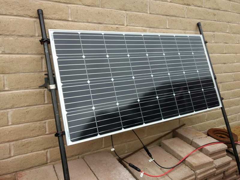 Here's the rack/solar-panel leaned up against the house.
