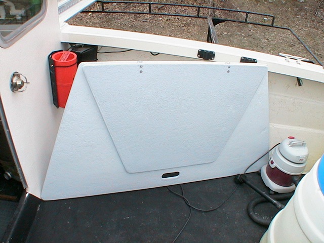 hinges; i used two stainless ones that came off of an engine cover for a larger boat (salvage parts) I'm sure a piano hing would have been better :o|
