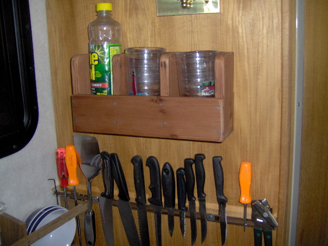 Holds glasses , cups, soap ect.