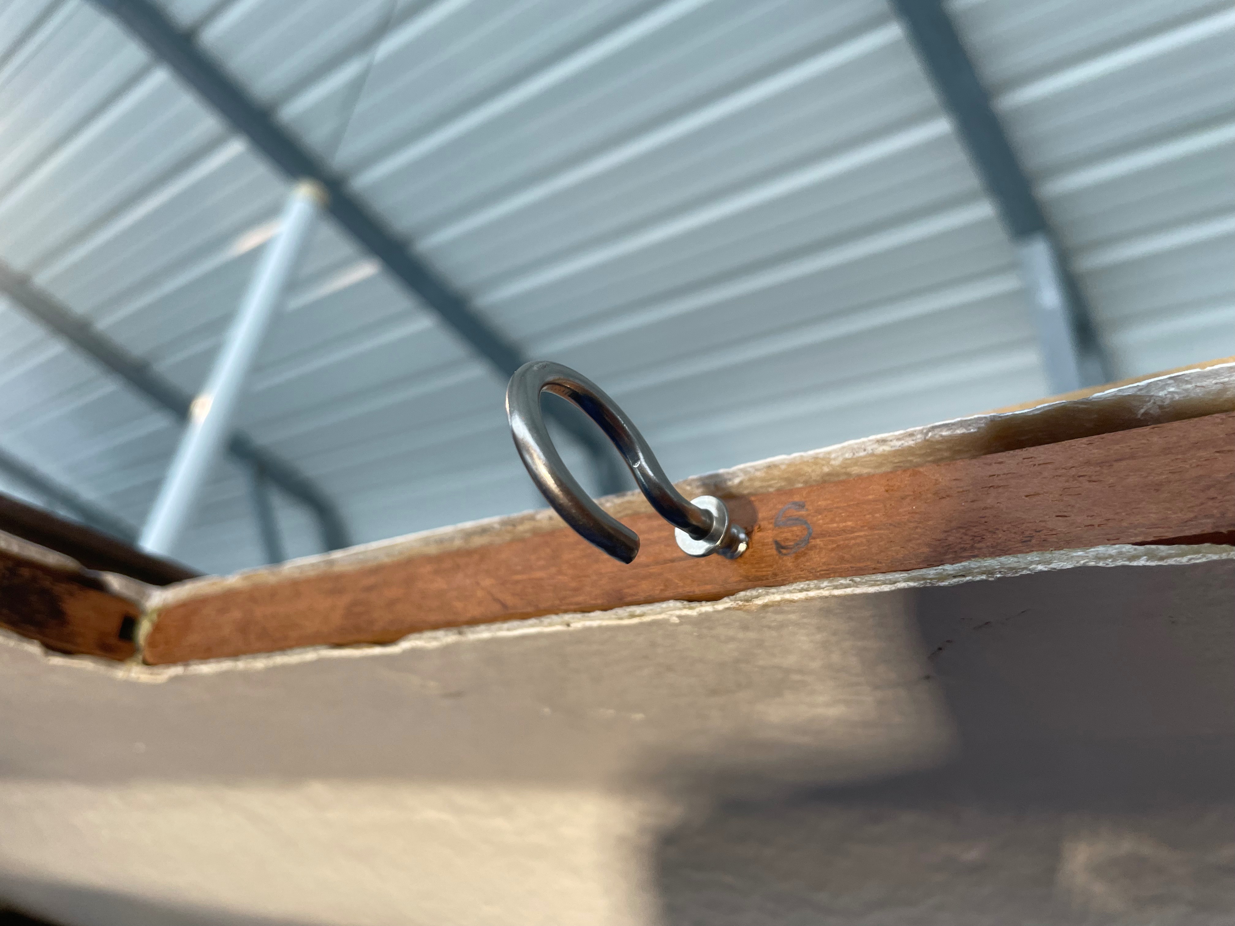 Hook allows repeated removal for fitment