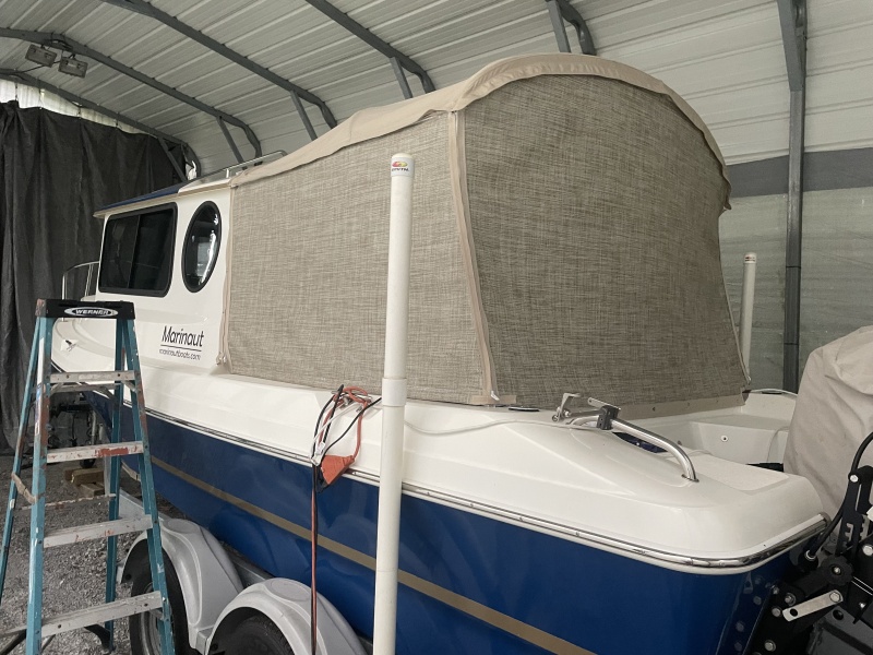 huge plus is that I didn?t need to cut and insert clear windows with all the extra framing, zippers, screens, and LOTS of extra sewing... simple is the watchword for this particular endeavor? less working and more playing on this boat 
I do love finding elegant solutions to challenges? keeping the old grey matter working.. Ha!