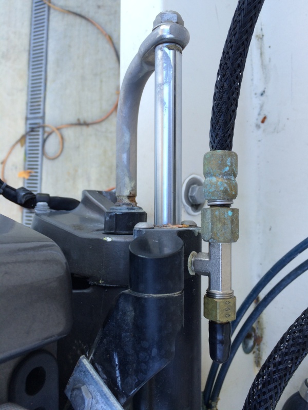 Hydraulic line from DC pump enters the port side of hydraulic piston.