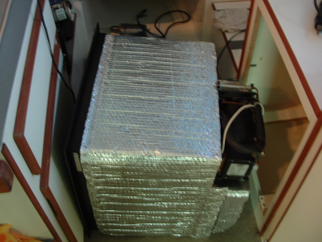 I added a layer of 3/4" foil backed closed cell foam insulation to further reduce heat intrusion.
